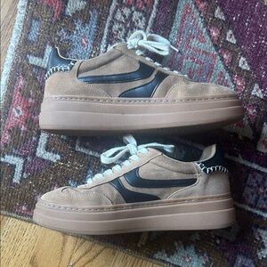 Stylish Tan and Black Steve Madden sneakers